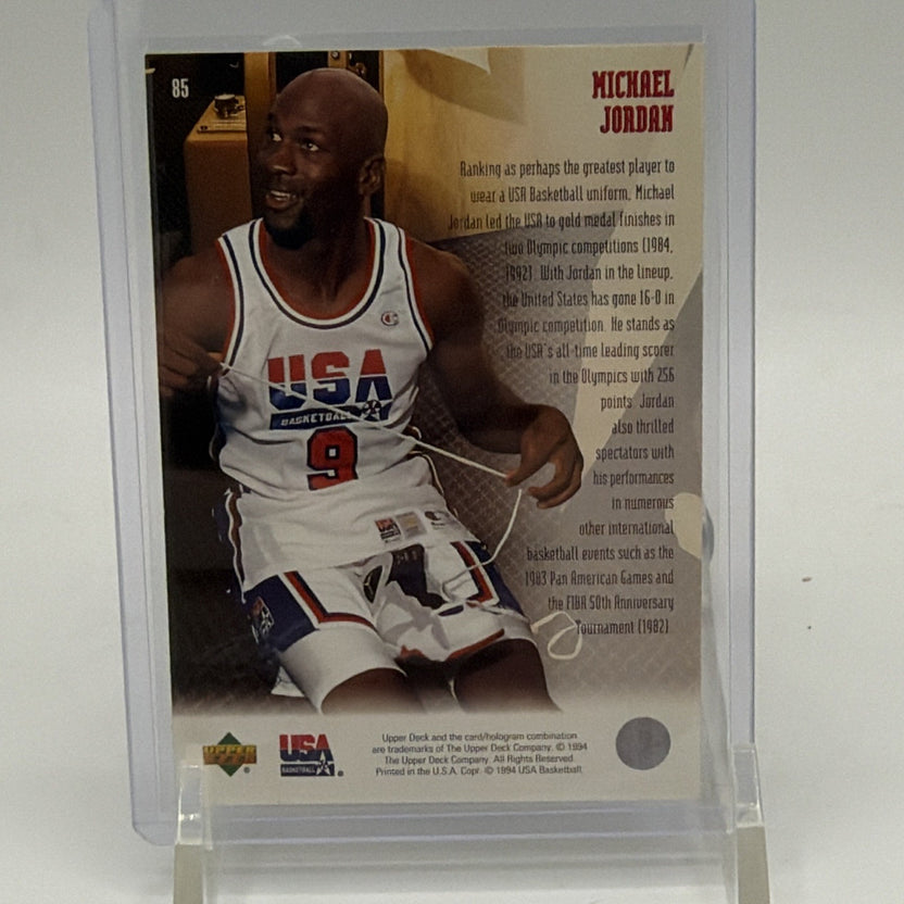 Reverse of 1994 Upper Deck USA Basketball Michael Jordan #85 showing player photographs and biographical text