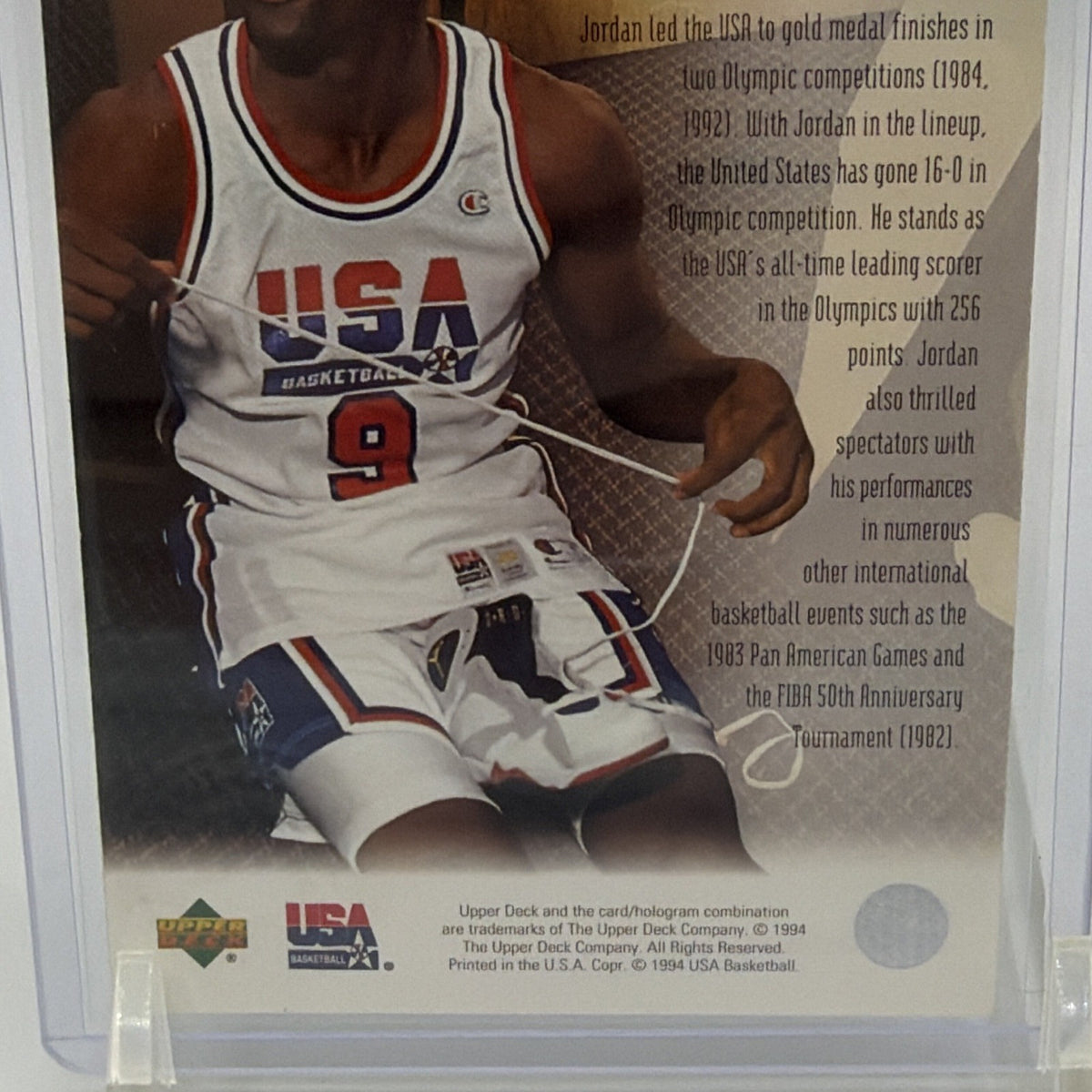 Lower reverse detail of 1994 Upper Deck USA Basketball Michael Jordan #85 featuring Team USA imagery