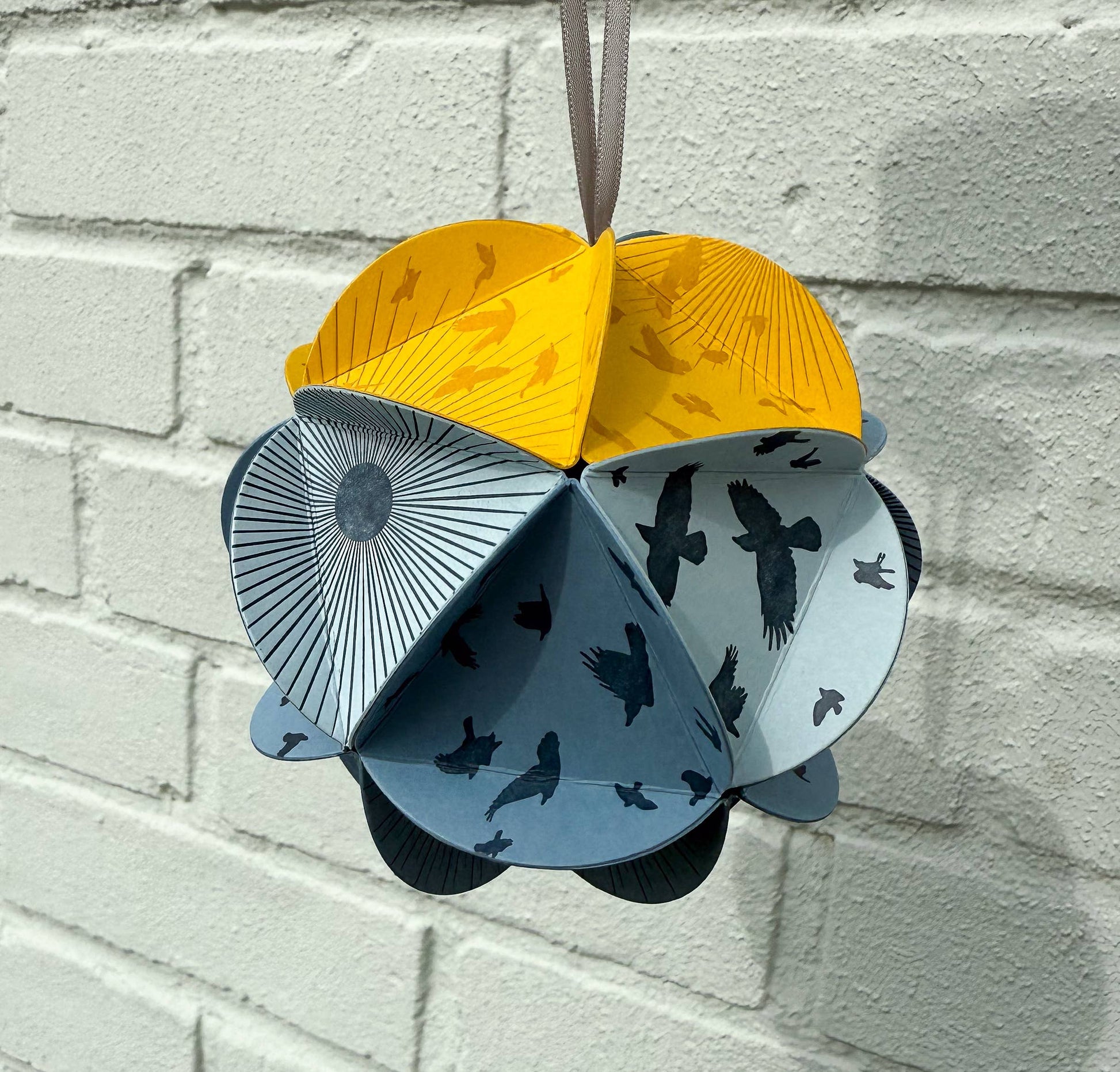 icosahedron ornament kit, diy paper ornament, winter solstice craft kit, letterpress ornament circles, geometric paper craft, holiday diy kit, blackbird letterpress kit, winter craft for kids and adults, paper ornament project, celestial ornament craft, 3d paper ornament kit, gift topper idea, handmade holiday craft, winter solstice decoration, rogue & rye craft kits, letterpress diy project, mindful crafting gift