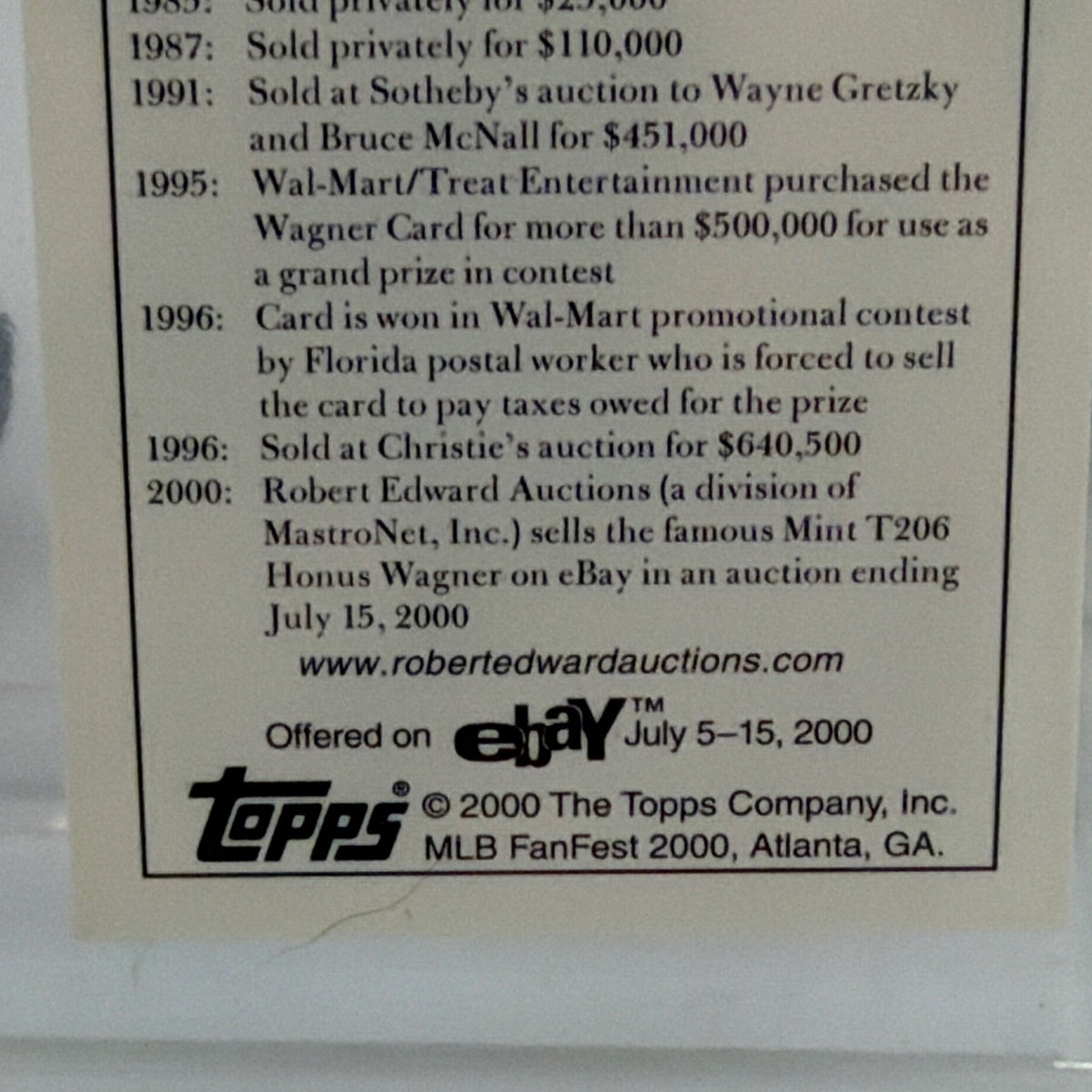 Close-up of Topps branding and commemorative information on card reverse
