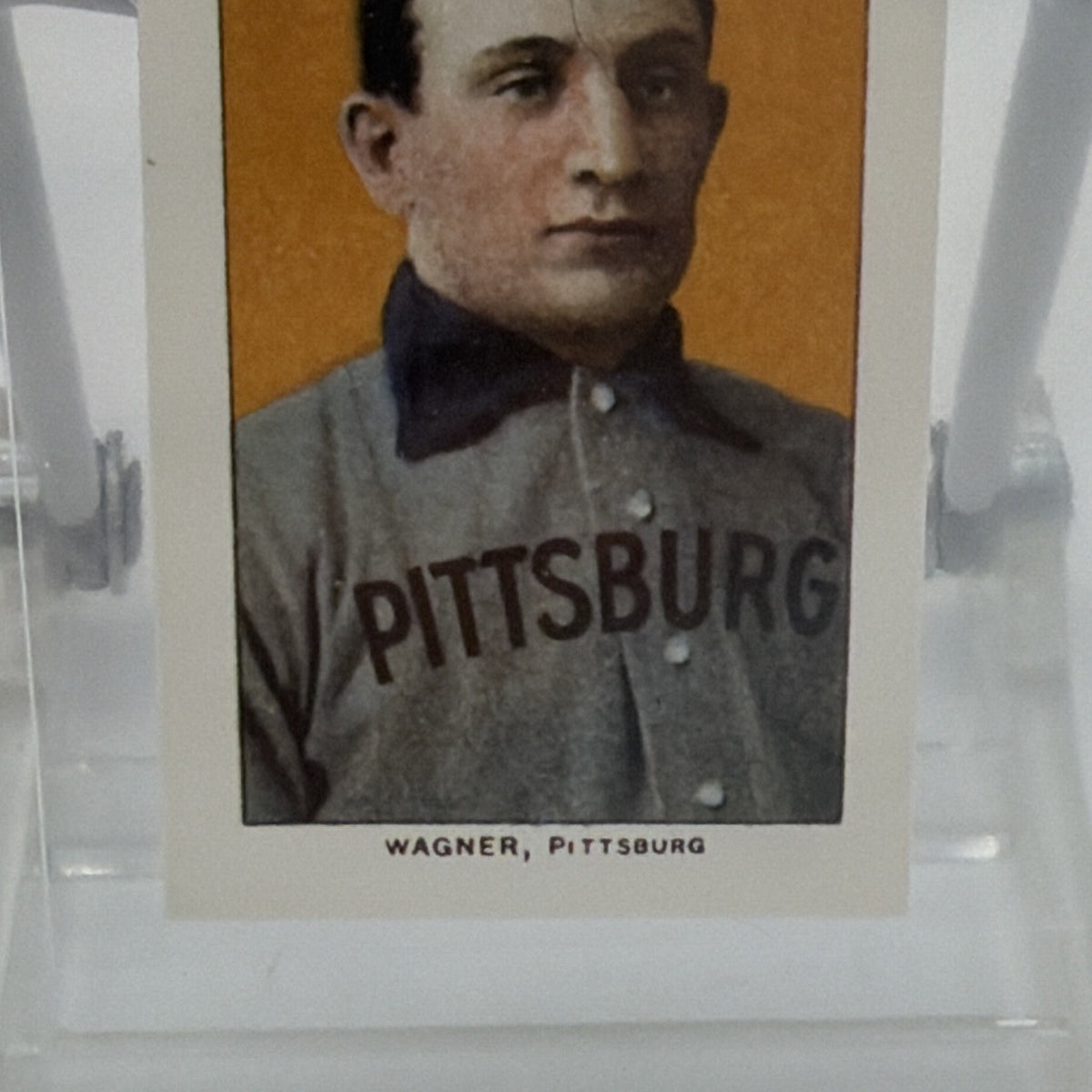 Detail of Pittsburgh lettering on Honus Wagner uniform and card nameplate
