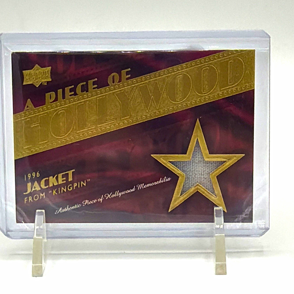 Front of 2008 Upper Deck A Piece of Hollywood Kingpin jacket memorabilia card #HM-24