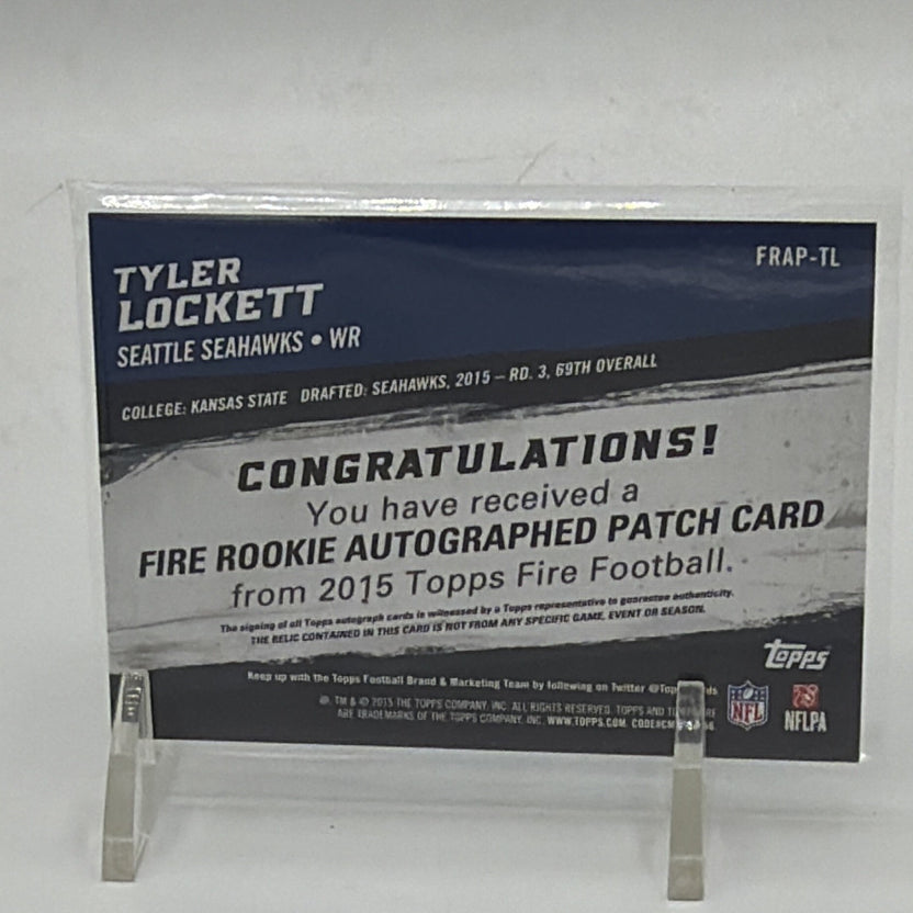 Back of Tyler Lockett 2015 Topps Fire Rookie Autographed Patch Blue #FRAP-TL numbered 04/75