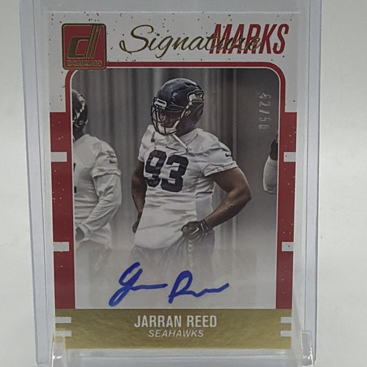 Front of 2016 Donruss Signature Marks Jarran Reed autograph #97 numbered 42/50
