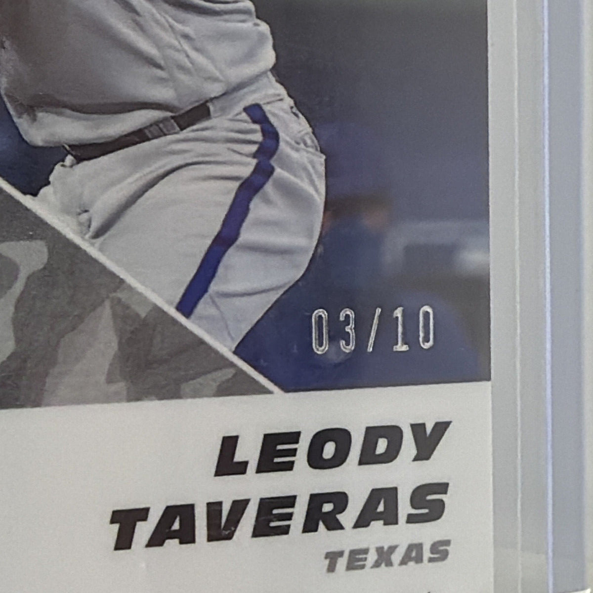 Close-up of Leody Taveras Gold Quick Pitch autograph card serial number 03/10
