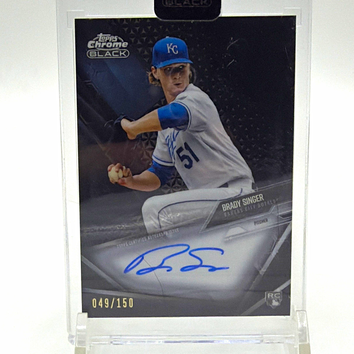 Front of 2021 Topps Chrome Black Brady Singer rookie autograph Refractor numbered 049/150