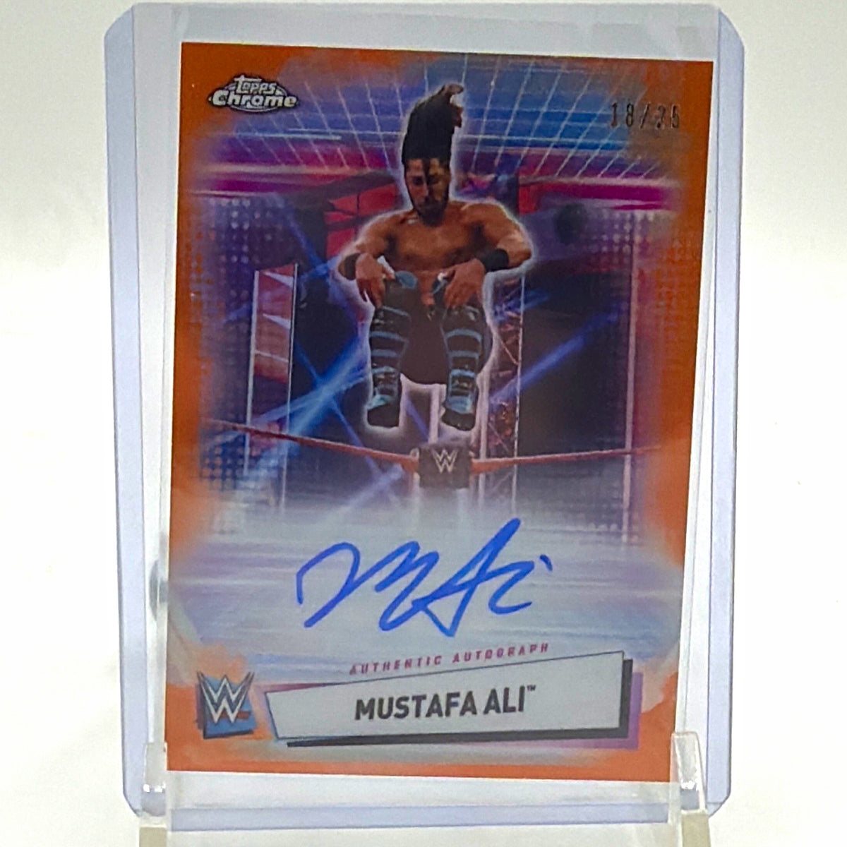 Front of 2021 Topps Chrome WWE Mustafa Ali #A-MA Orange Refractor autograph numbered 18/25
