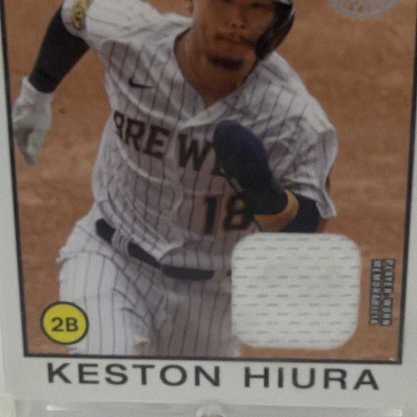 Detail of Keston Hiura batting in his Milwaukee Brewers uniform on the 1986 Topps-inspired card