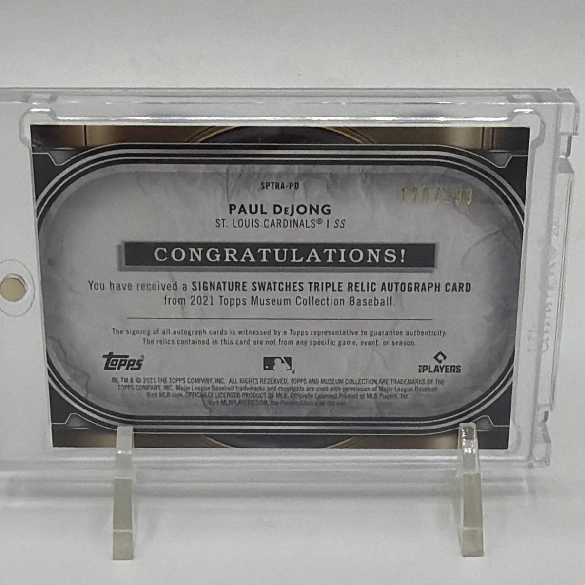 Back of 2021 Topps Museum Collection Paul DeJong Signature Swatches Triple Relic Autograph #SPTRA-PD