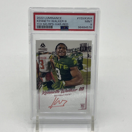 PSA Mint 9 2022 Panini Luminance Year One Signatures RPS Variation Red rookie autograph card of Kenneth Walker III.