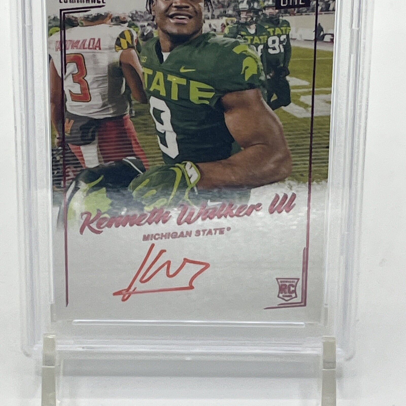 Close-up of the PSA Mint 9 autograph on a 2022 Panini Luminance Kenneth Walker III Year One Signatures rookie autograph card.