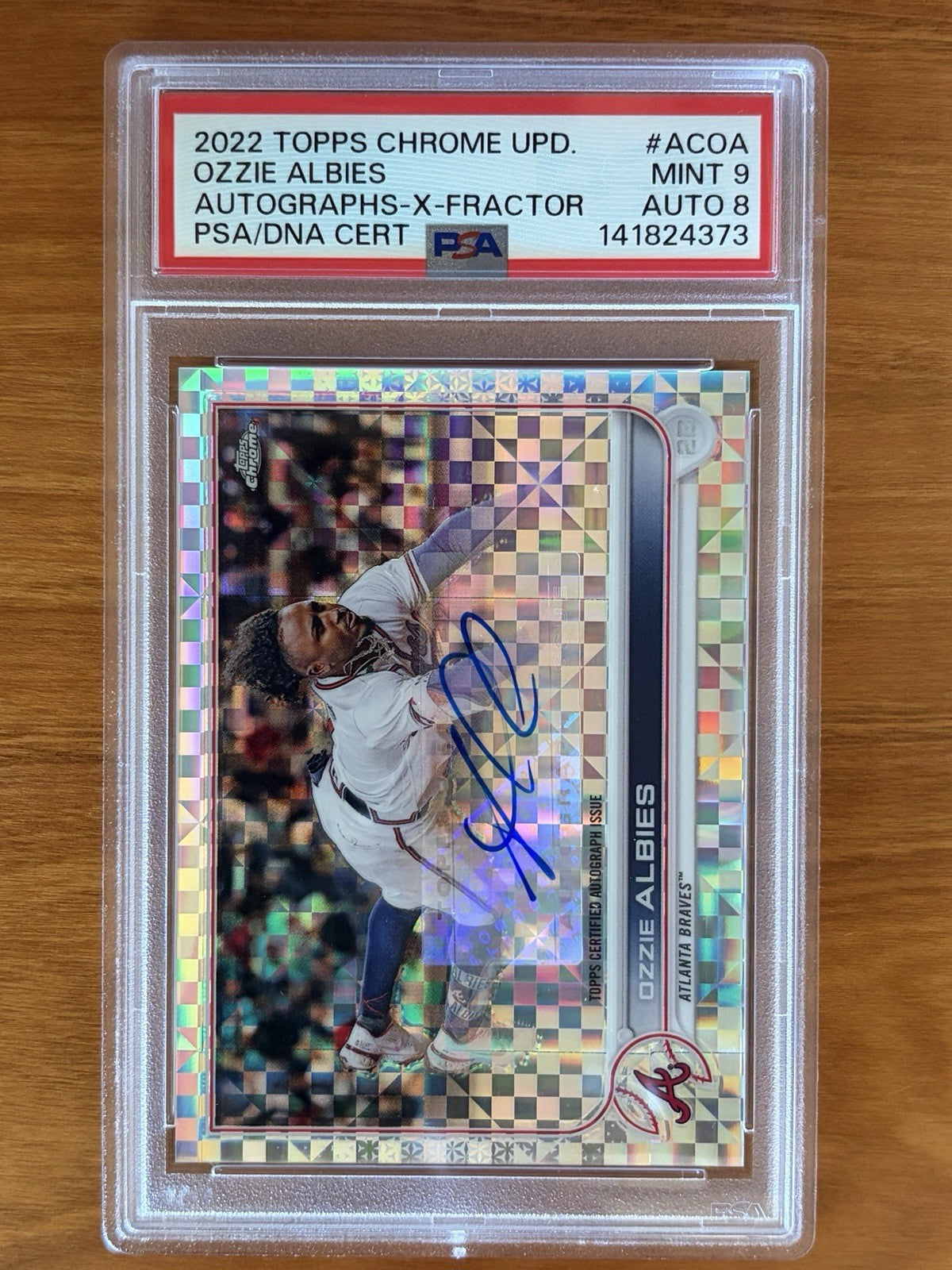 2022 Topps Chrome Update Ozzie Albies X-Fractor autograph card numbered 119 of 125 graded PSA 9 with PSA Auto 10 signature. 2022 Topps Chrome Update Autographs Ozzie Albies X-Factor PSA 9 Numbered /125