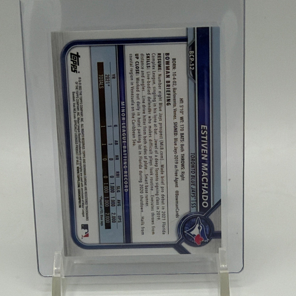 Reverse of 2022 Bowman Chrome Prospects Estiven Machado Green Refractor card with player information