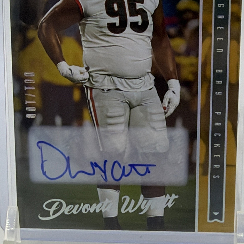 Close-up of blue Devonte Wyatt autograph and gold-accented Luminance card design