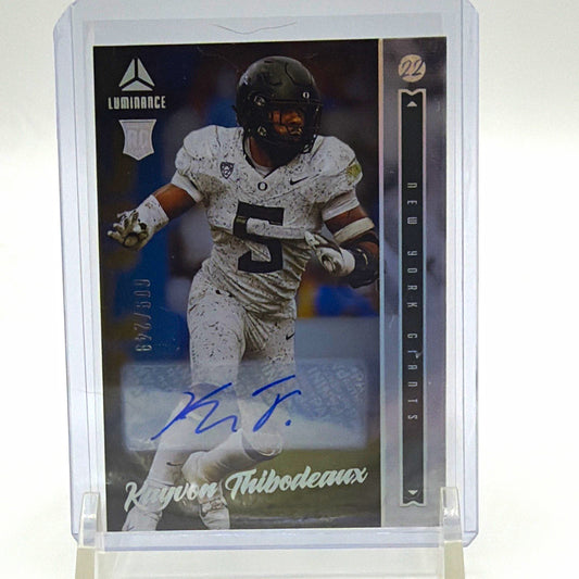 Front of 2022 Panini Luminance Kayvon Thibodeaux rookie autograph #136 numbered 009/249