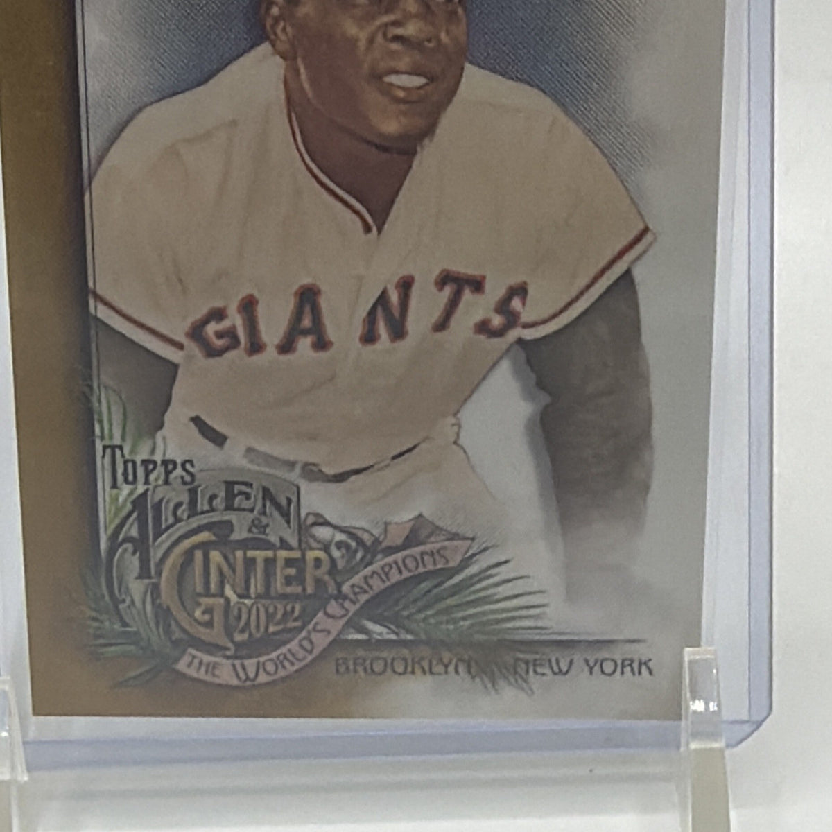 Lower front detail of Willie Mays Gold Refractor card showing Giants uniform and Allen & Ginter design