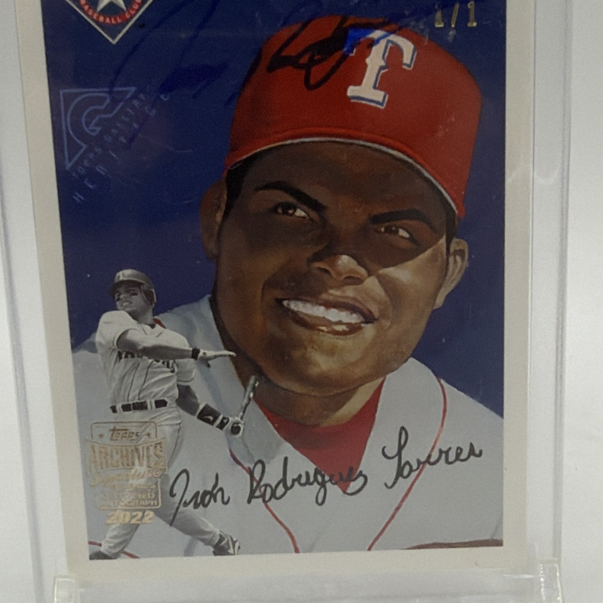 Detail of black-ink Ivan Rodriguez autograph across vintage-style Texas Rangers baseball card