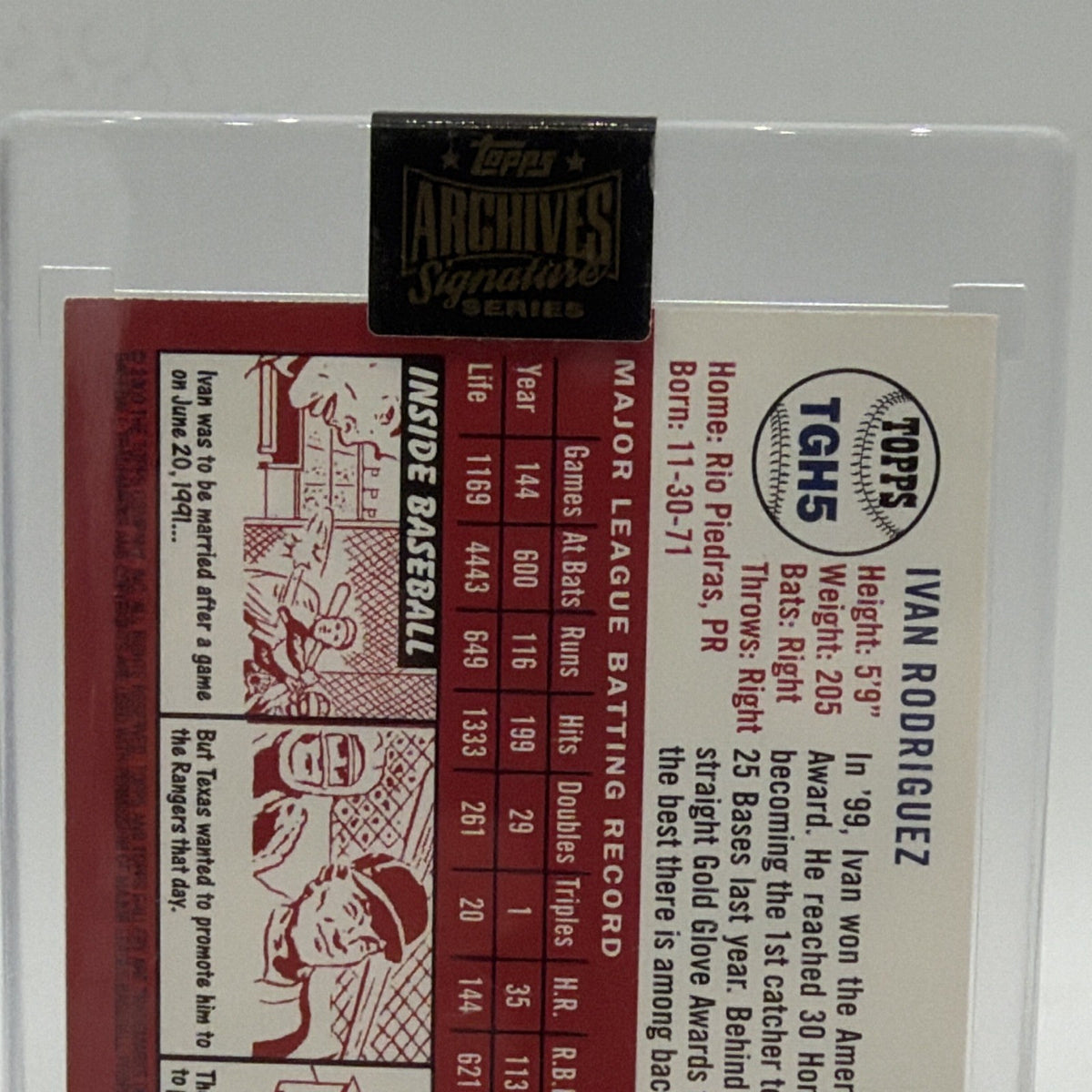 Close-up of player statistics and biography on reverse of Ivan Rodriguez baseball card