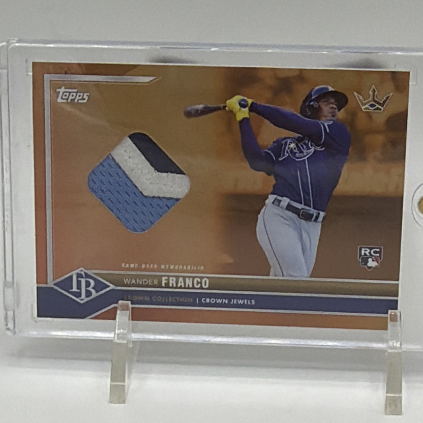 Front of 2022 Topps X Bobby Witt Jr. Crown Jewel Wander Franco rookie relic card numbered 4/5
