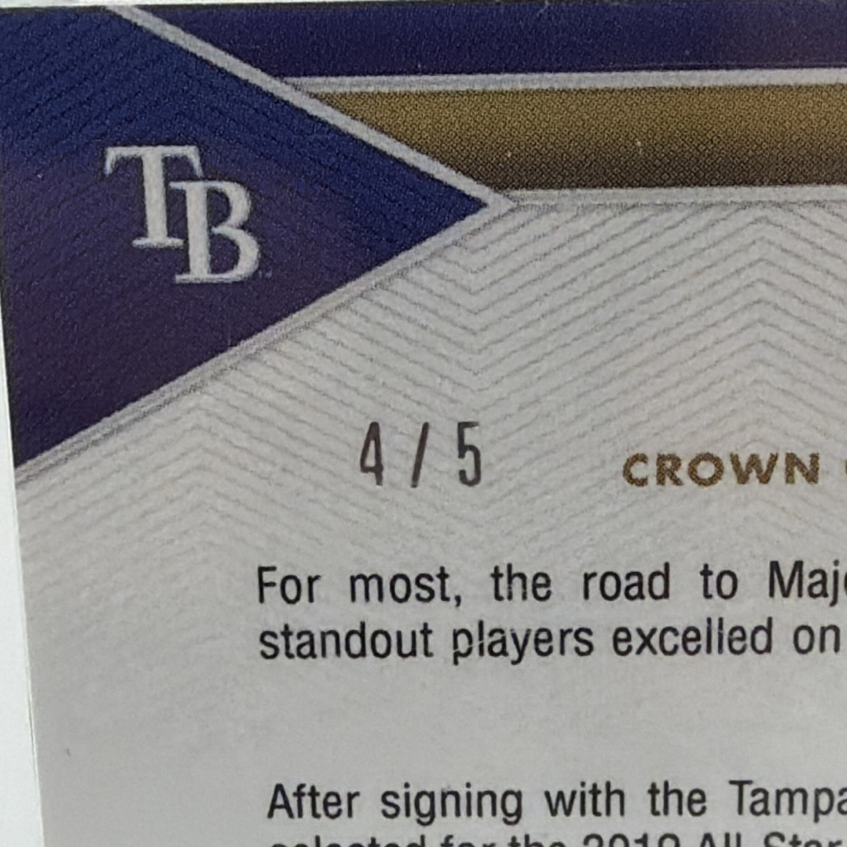 Close-up of Wander Franco Crown Jewel card serial numbering 4/5 and printed memorabilia statement