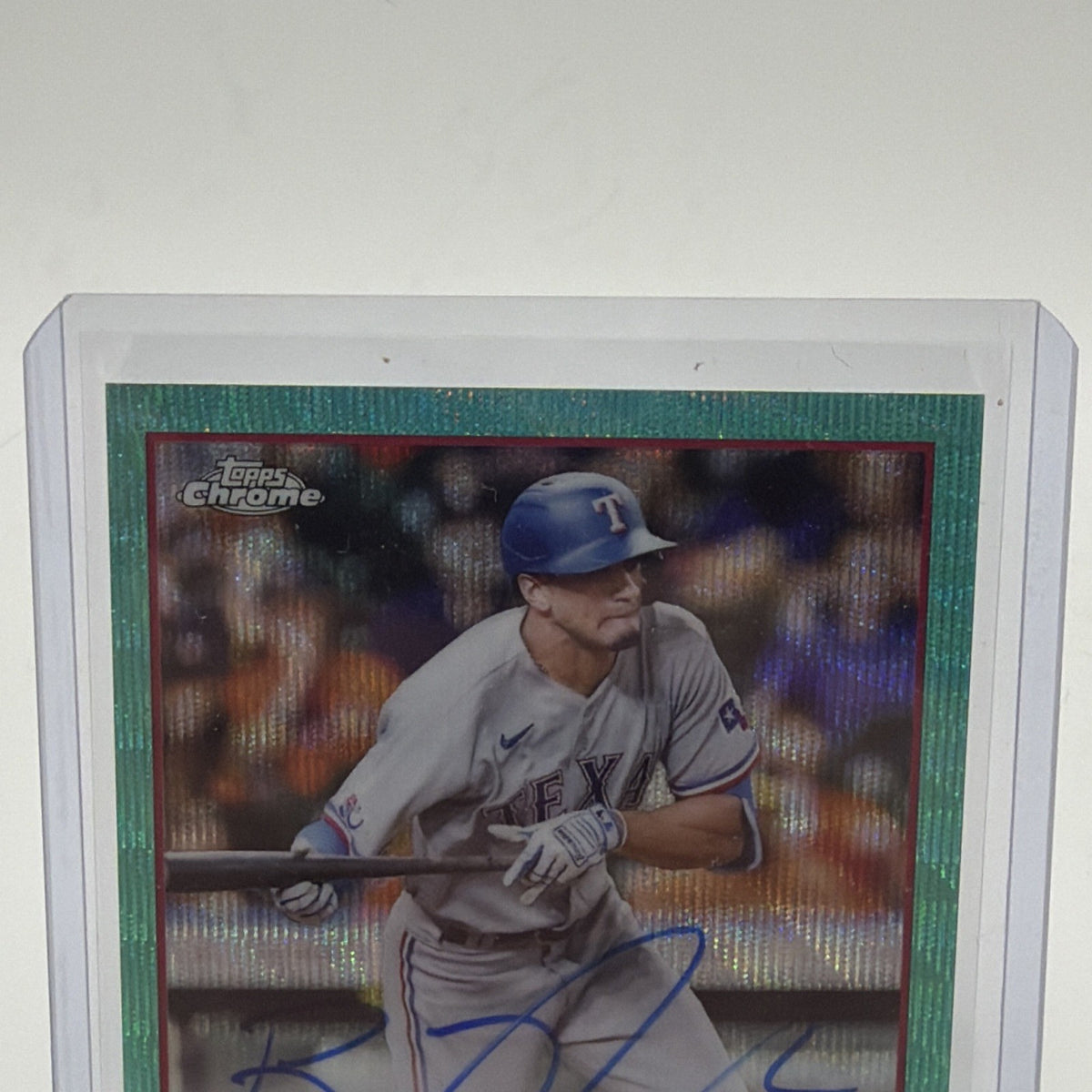 Close-up of Bubba Thompson Topps Chrome rookie autograph card in protective holder