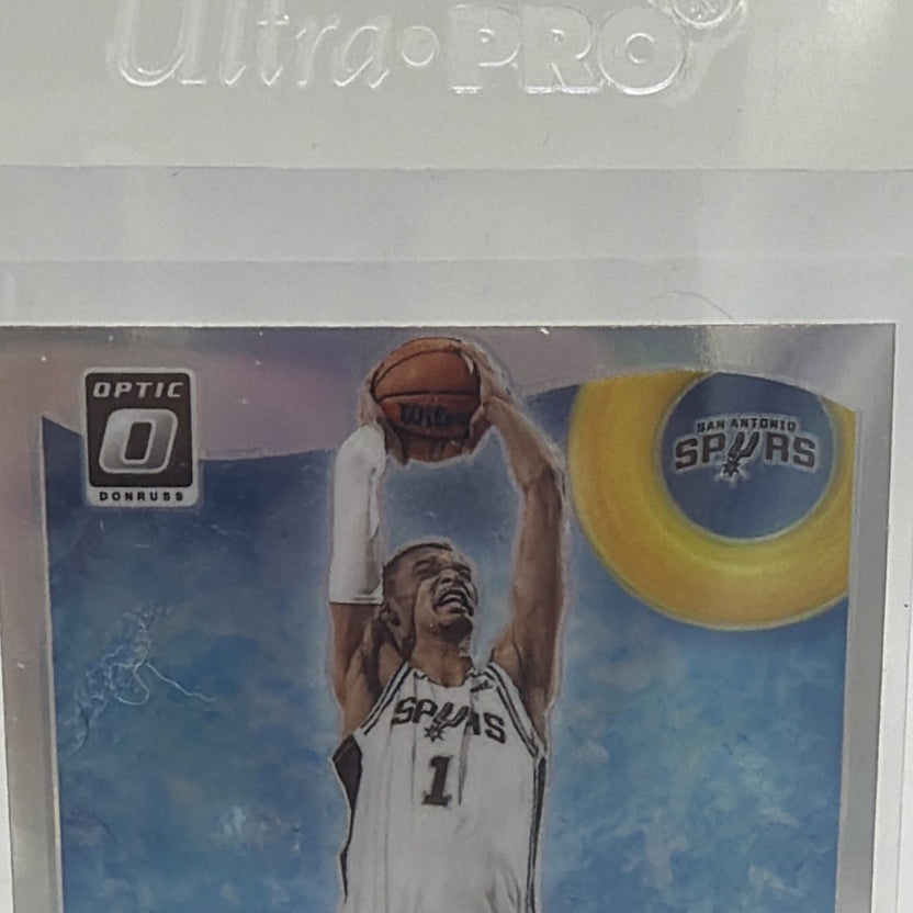 Close-up of Victor Wembanyama shooting in a white Spurs uniform on the Splash rookie insert
