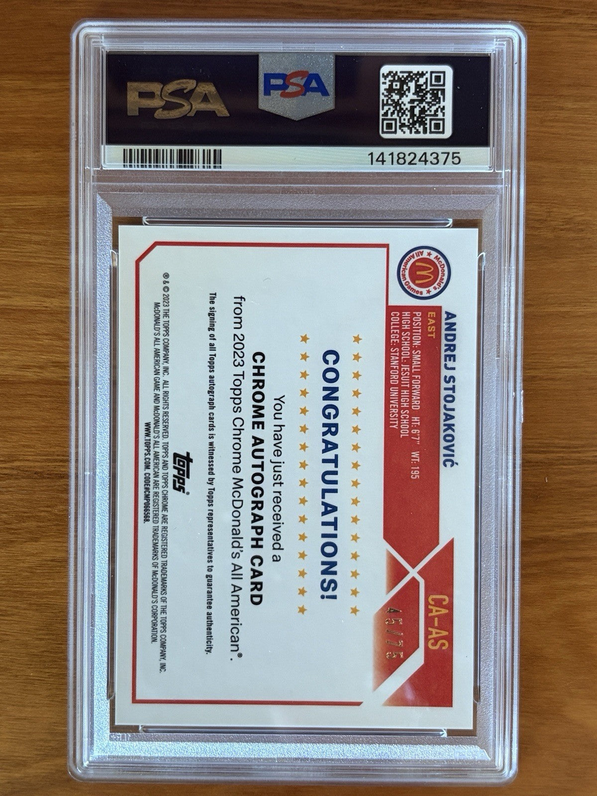 2023 Topps Chrome McDonald's All American Andrej Stojakovic PSA 10 Auto Yellow Reverse of PSA graded 2023 Topps Chrome McDonald's All American Andrej Stojakovic Yellow Refractor autograph card #45/75 featuring Topps autograph certification and card details.