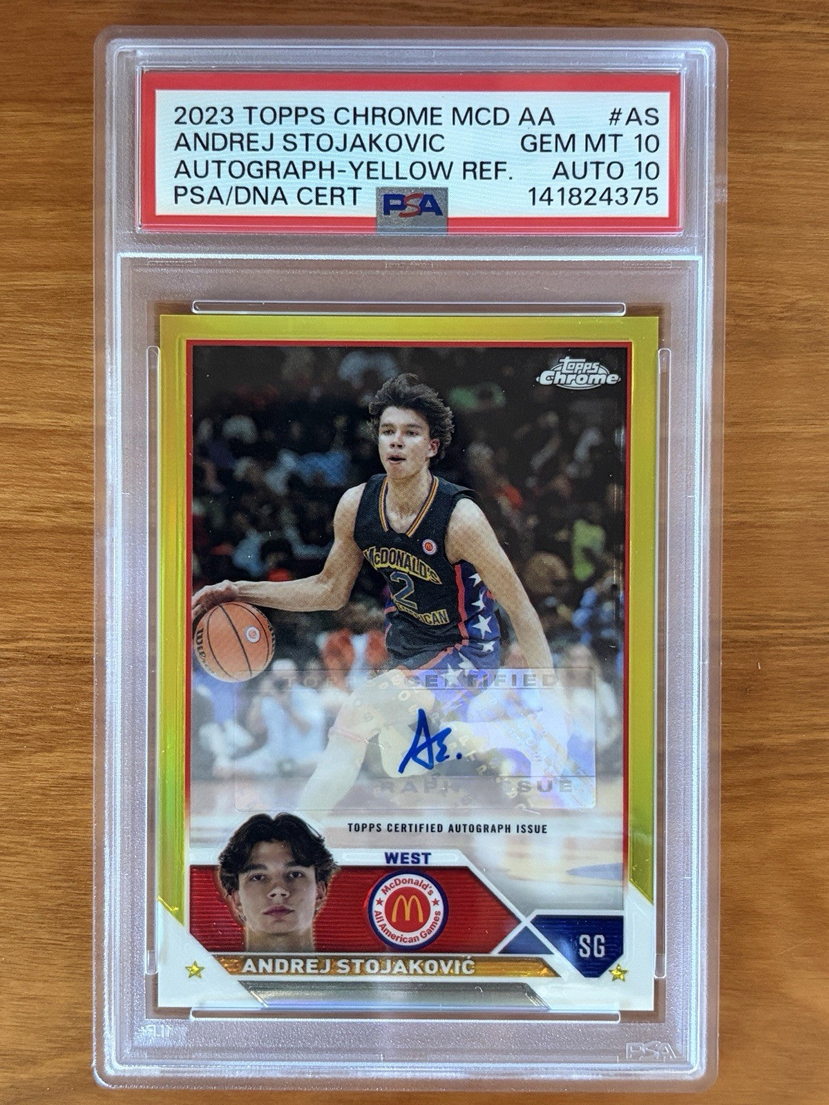 2023 Topps Chrome McDonald's All American Andrej Stojakovic PSA 10 Auto Yellow. 2023 Topps Chrome McDonald's All American Andrej Stojakovic Yellow Refractor autograph card numbered 45 of 75, graded PSA 10 with PSA 10 autograph grade.