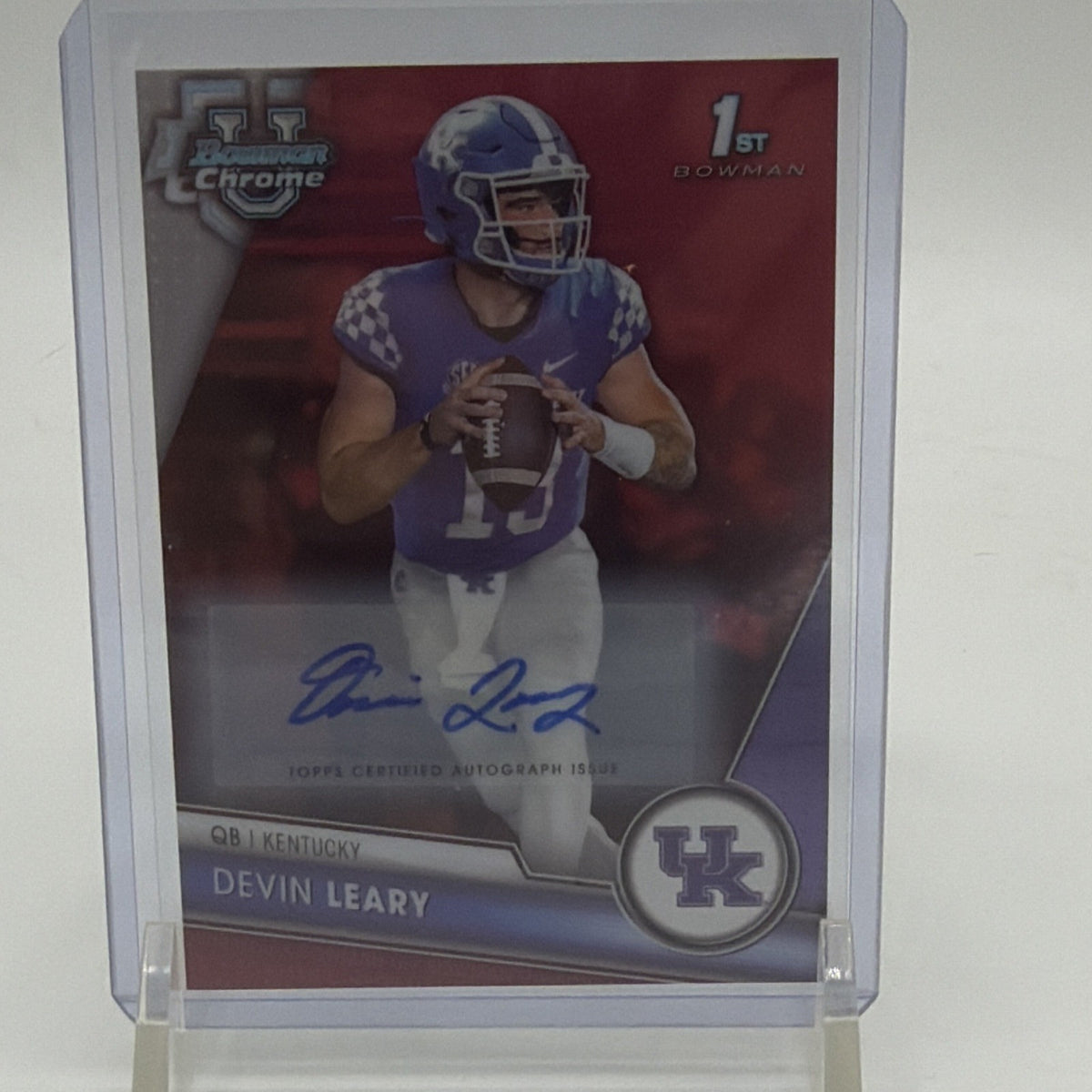 Front of 2023 Bowman University Chrome Devin Leary 1st Bowman Red Refractor autograph numbered 1/5