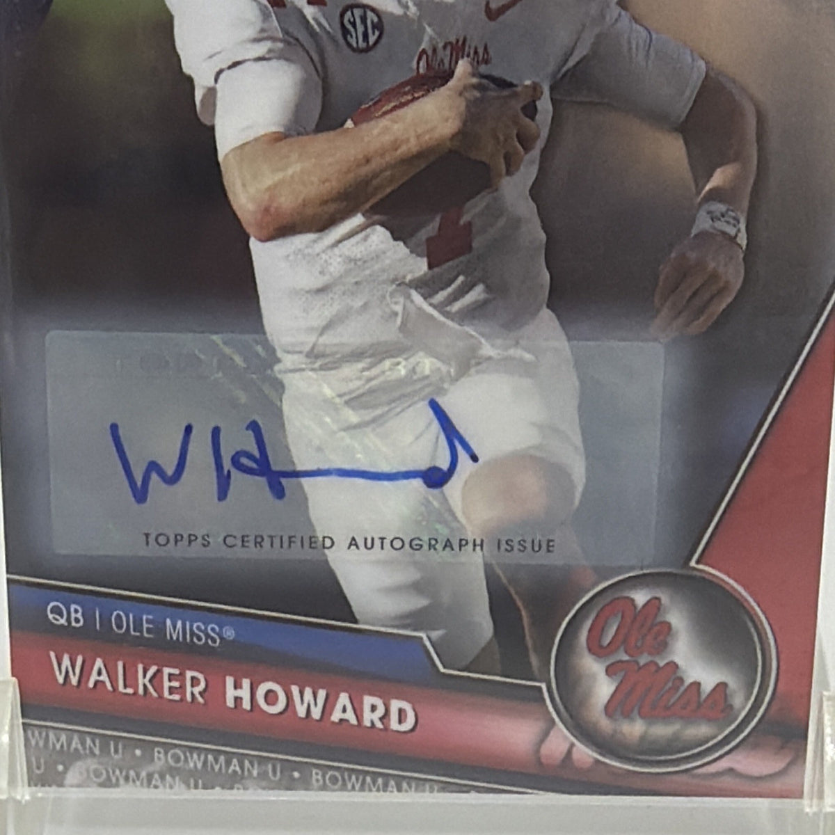 Close-up of blue-ink Walker Howard autograph and Ole Miss Rebels identification