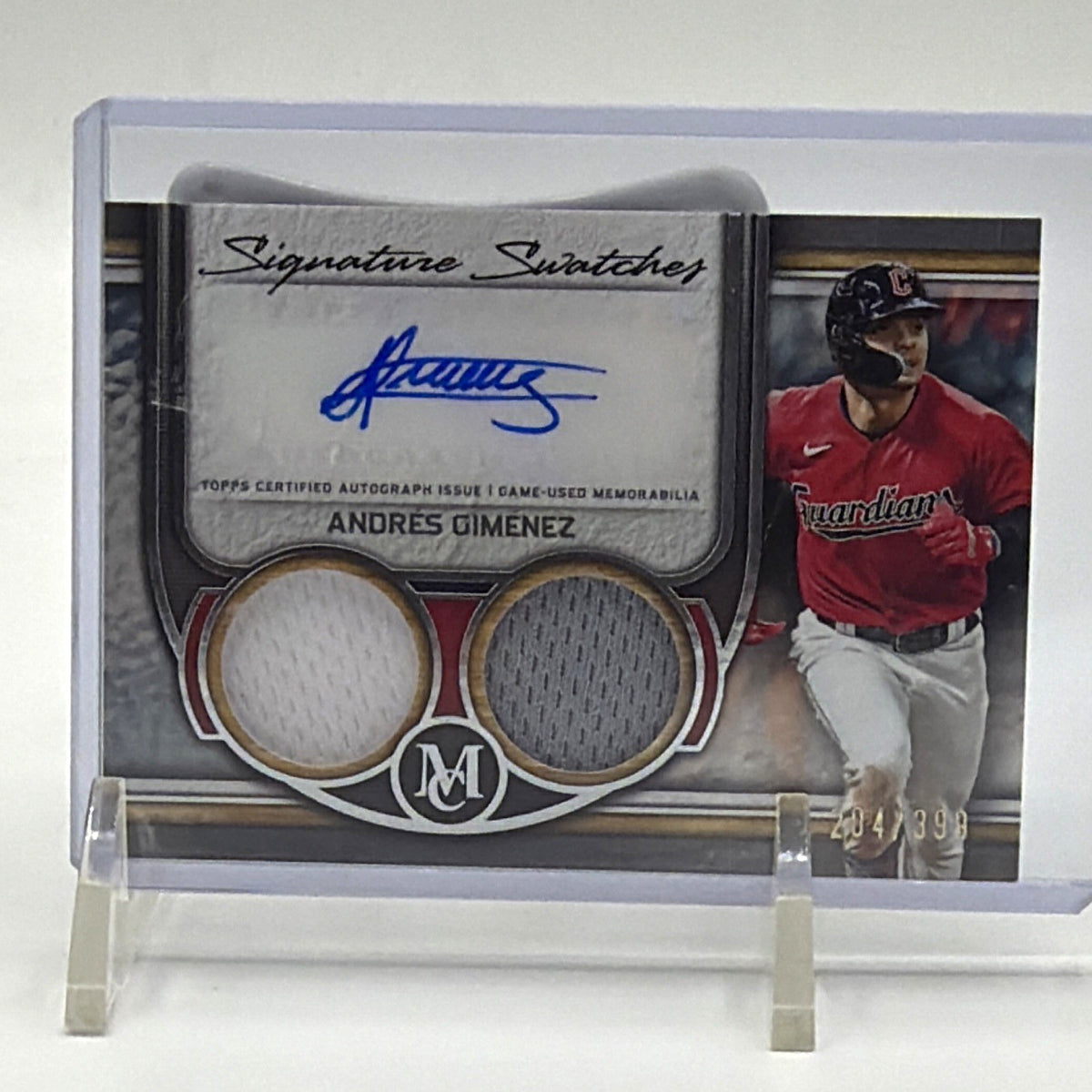 Front of 2023 Topps Museum Collection Andrés Giménez autograph dual relic #SWDRA-AG numbered 204/399
