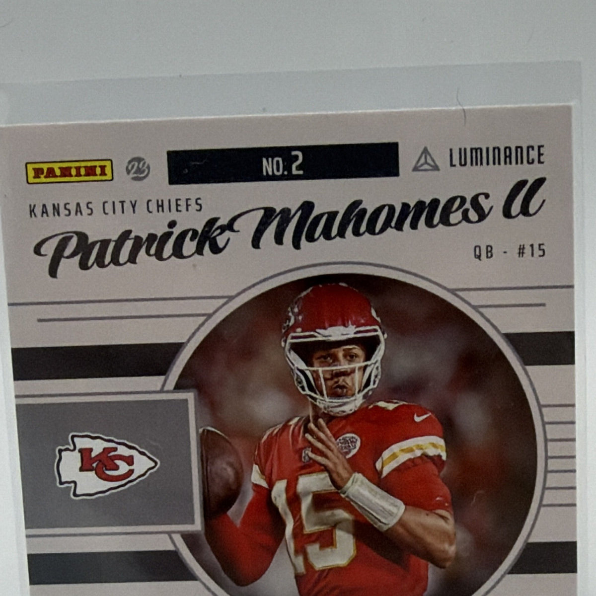 Close-up of Patrick Mahomes biography and Chiefs imagery on card reverse