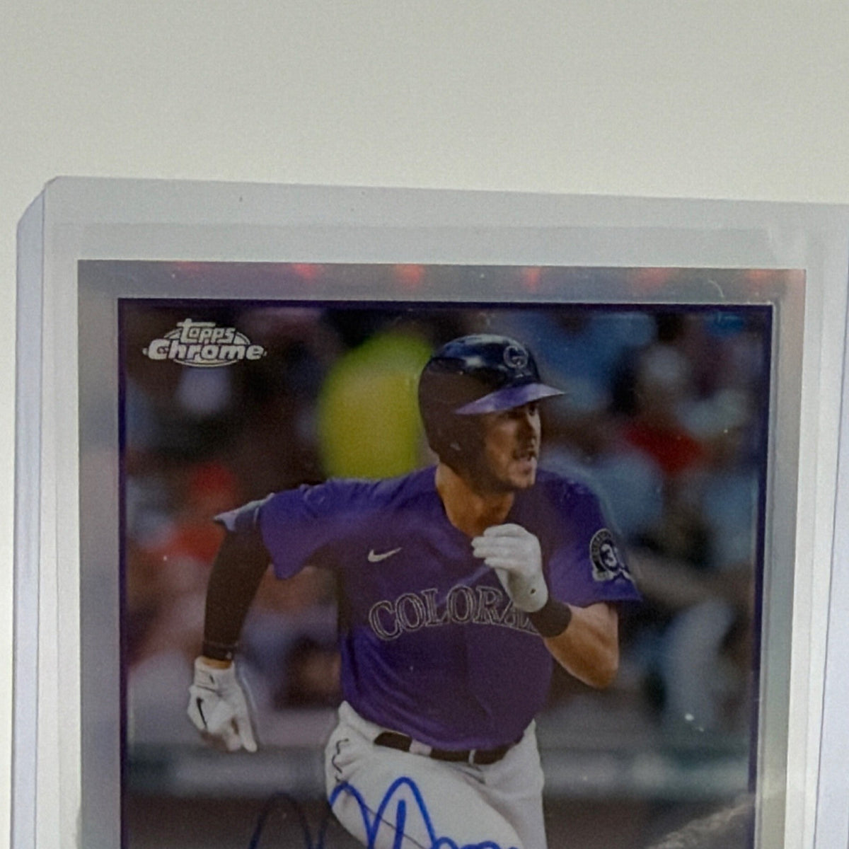 Close-up of blue Nolan Jones autograph on Topps Chrome rookie baseball card