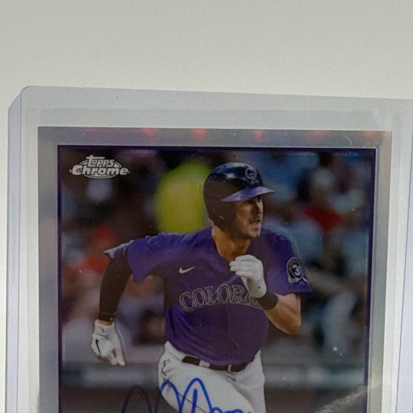 Close-up of blue Nolan Jones autograph on Topps Chrome rookie baseball card