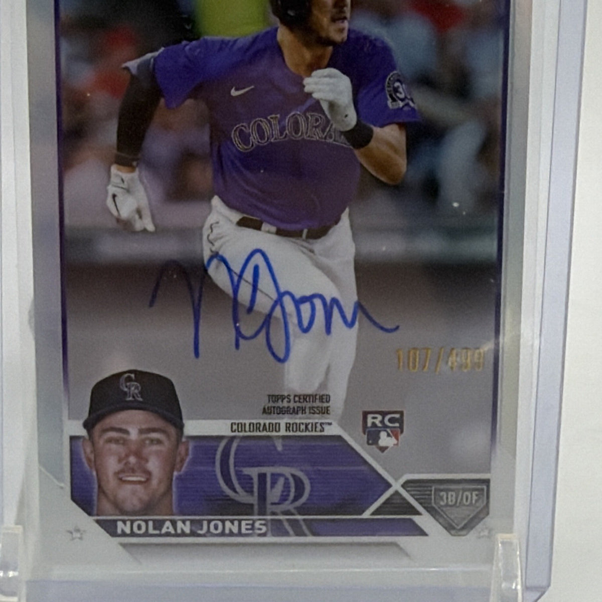 Detail of Nolan Jones rookie card portrait, autograph, and Rockies nameplate