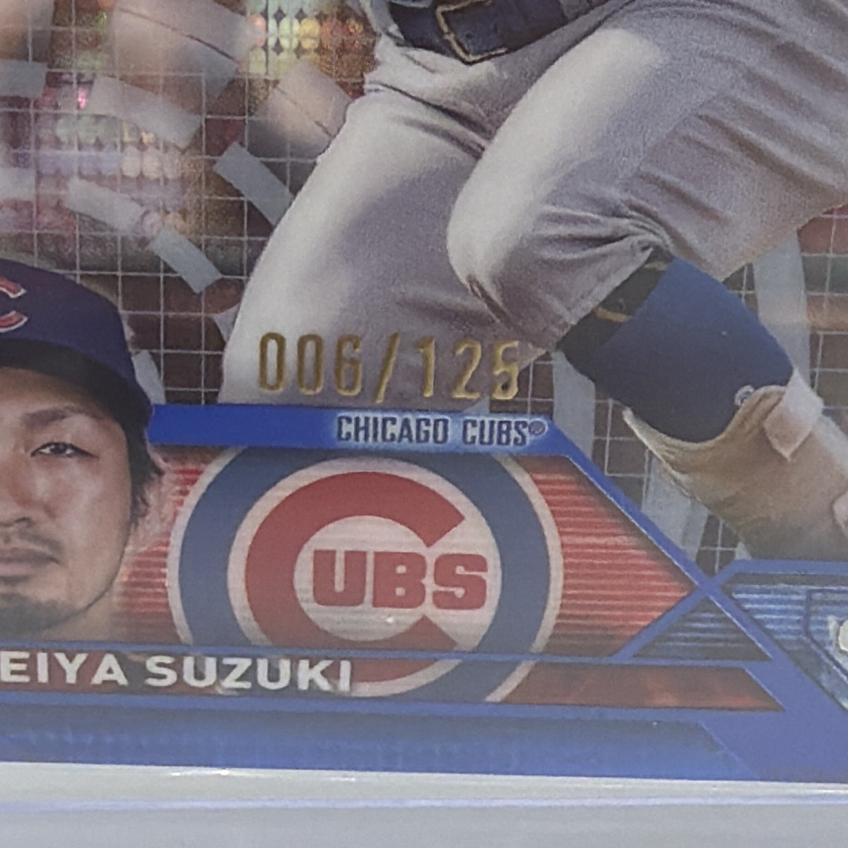 Close-up of serial number 006/125 on Seiya Suzuki Blue Sonar Refractor card