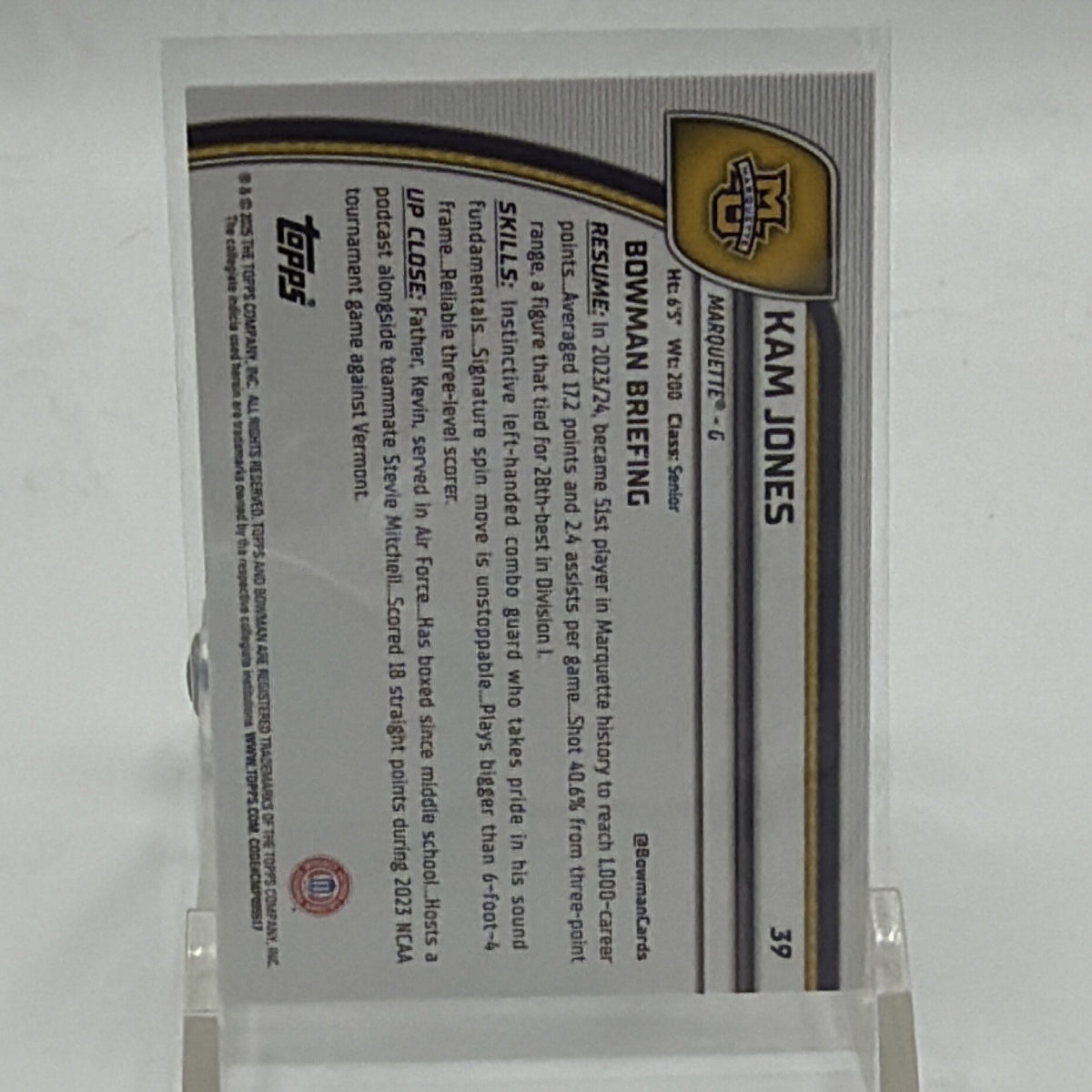 Back of 2024-25 Bowman Chrome University Kam Jones #39 Orange Reptilian Refractor numbered 9/25