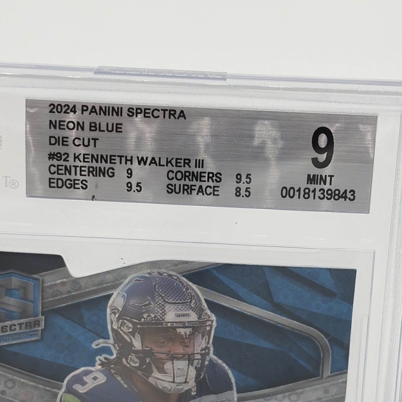 Beckett BGS 9 graded 2024 Panini Spectra Kenneth Walker III Neon Blue Die-Cut card showing grading label and subgrades for centering, corners, edges, and surface.
