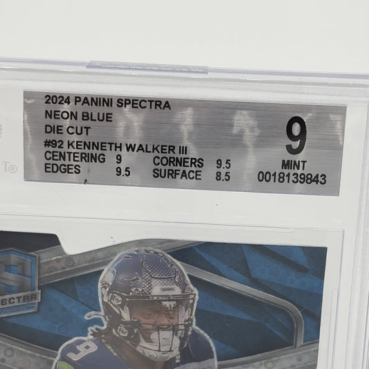 Beckett BGS 9 graded 2024 Panini Spectra Kenneth Walker III Neon Blue Die-Cut card showing grading label and subgrades for centering, corners, edges, and surface.