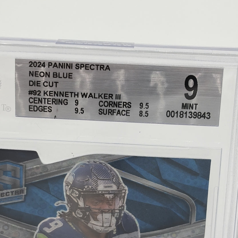 Beckett BGS 9 graded 2024 Panini Spectra Kenneth Walker III Neon Blue Die-Cut card showing grading label and subgrades for centering, corners, edges, and surface.