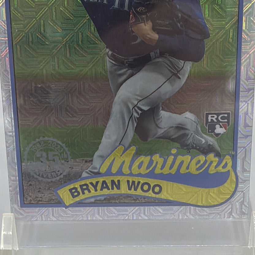 Detail of Bryan Woo rookie card showing Mariners lettering, player name, and RC emblem