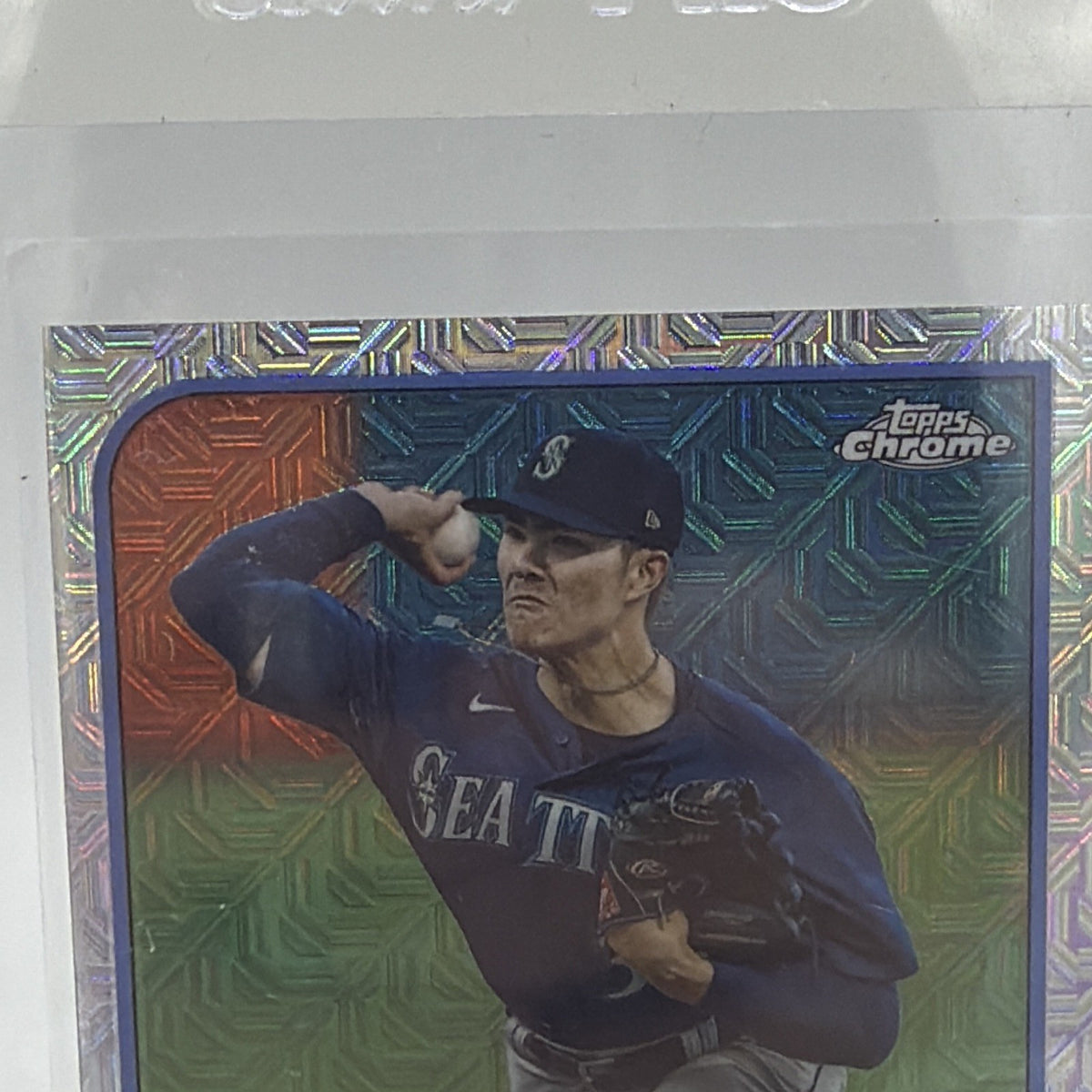 Close-up of Bryan Woo in Mariners uniform and patterned Chrome Silver Pack card border