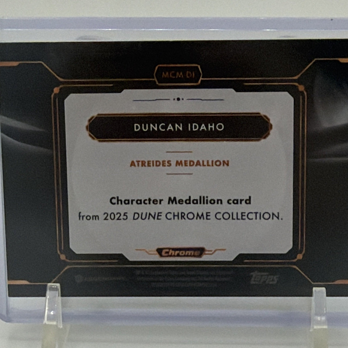Close-up of the reverse text and identification on the Duncan Idaho House Atreides medallion card