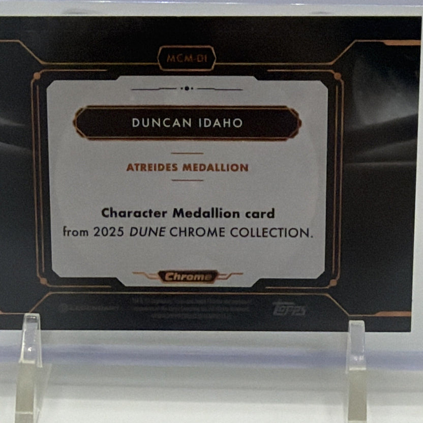 Reverse of Topps Chrome Dune Duncan Idaho MCM-DI card with manufactured medallion information