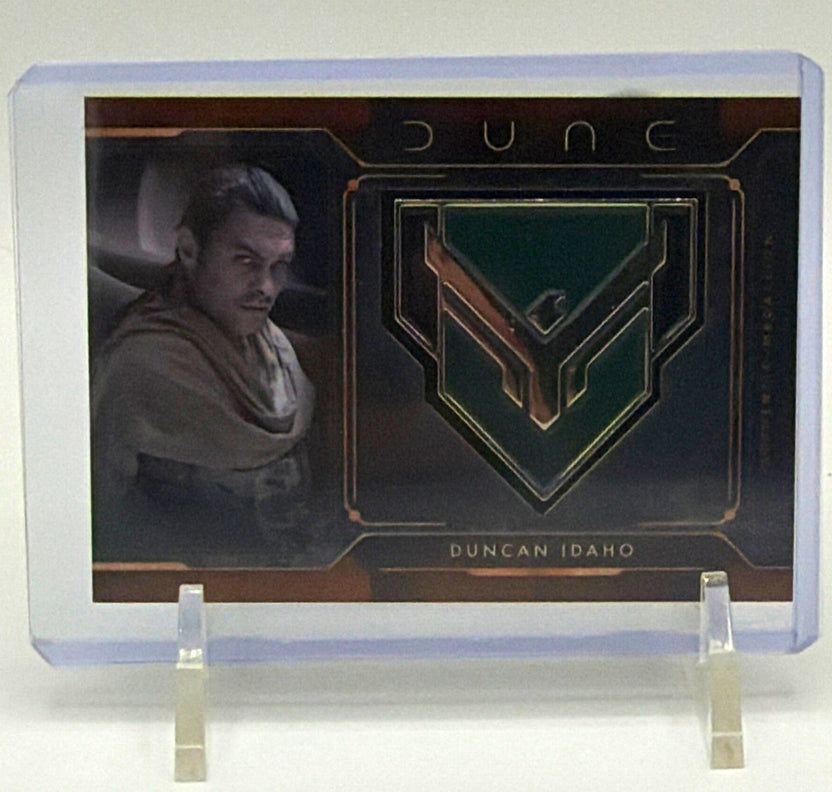 Front of 2024 Topps Chrome Dune Duncan Idaho MCM-DI trading card featuring Jason Momoa and House Atreides medallion