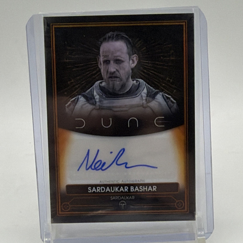 Front of Topps Chrome Dune Neil Bell autograph card A-NB, featuring Sardaukar Bashar portrait and blue signature