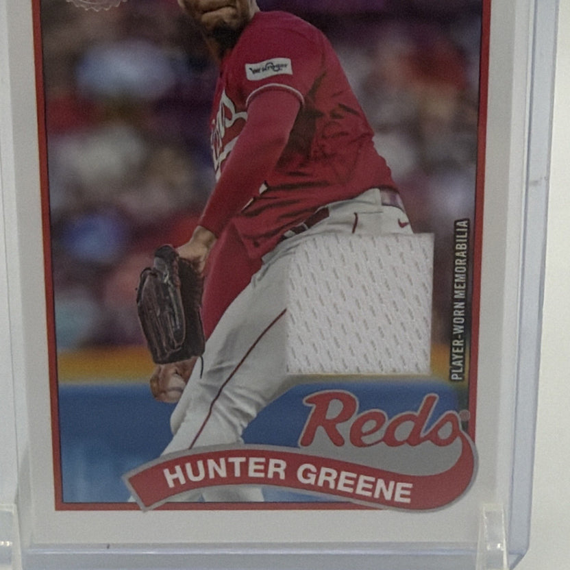 Close-up of Hunter Greene wearing his red Cincinnati Reds uniform on 2024 Topps relic card