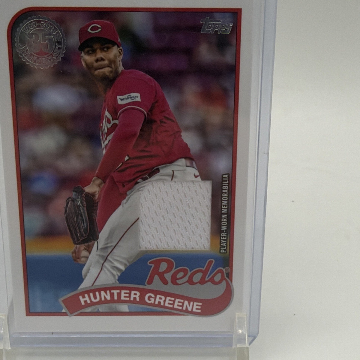 Detail of Hunter Greene 1989 Topps Baseball Relics card showing the embedded memorabilia swatch