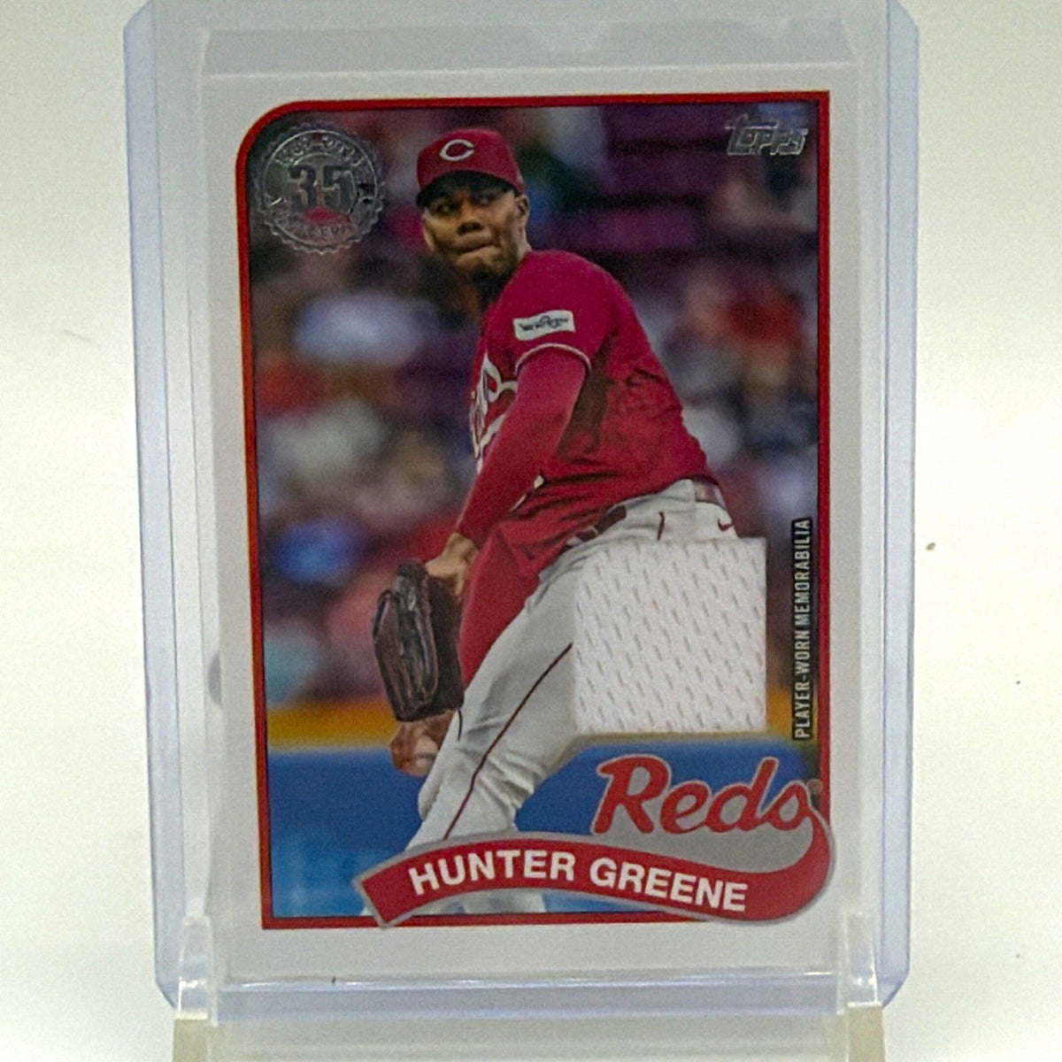 Front of 2024 Topps Series 1 Hunter Greene #89BR-HG 1989 Baseball Relic card featuring Cincinnati Reds pitcher
