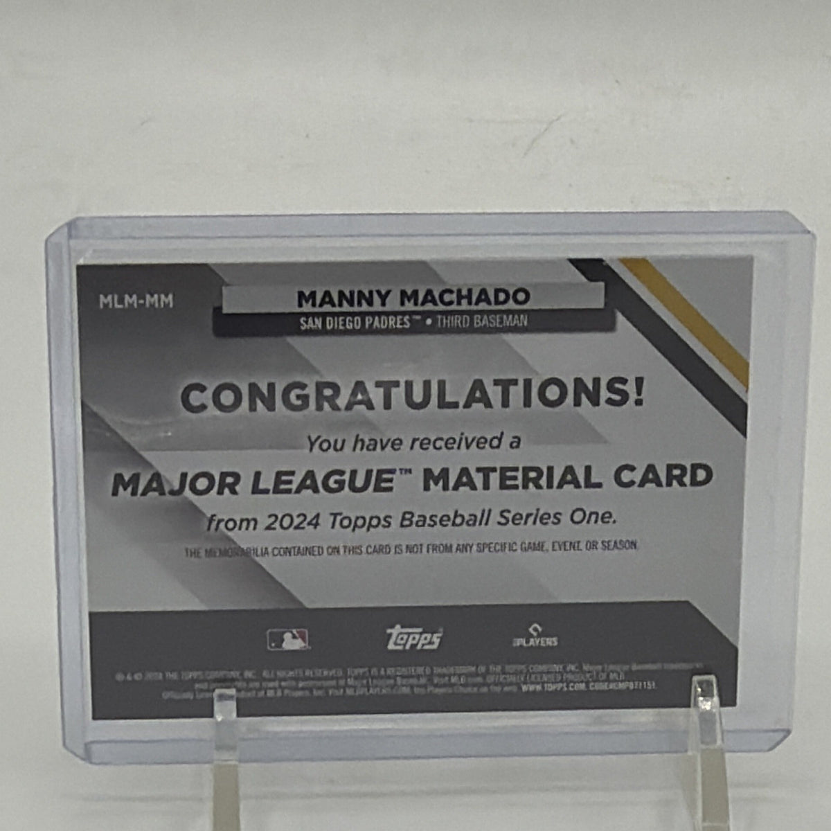 Back of 2024 Topps Series 1 Manny Machado Major League Material #MLM-MM